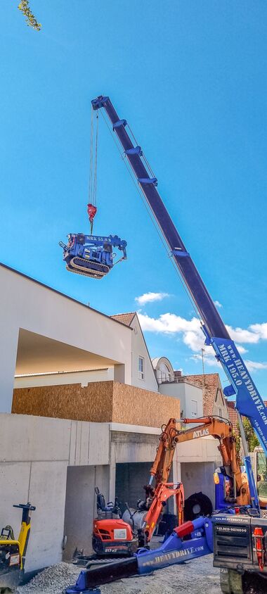 Levage de la grue MRK 55.0 S et de la vitre.